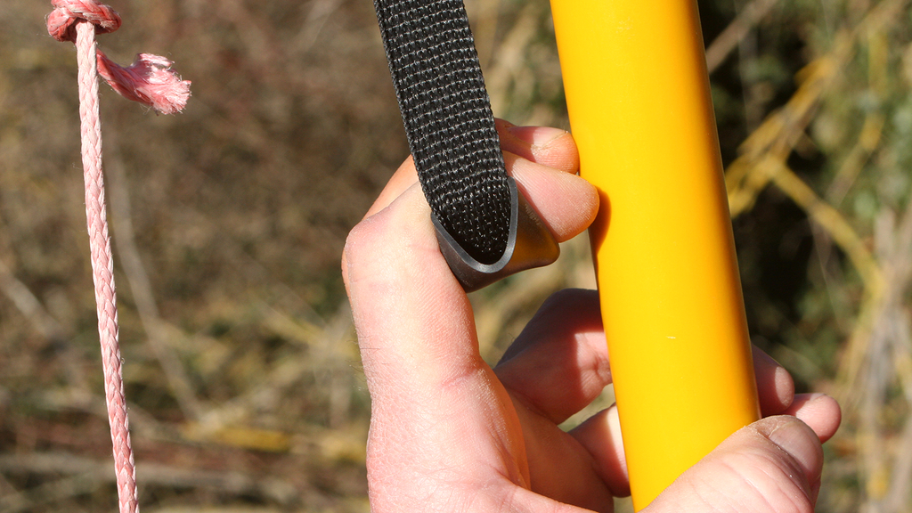 Vergrößerung des Bildes für Fingerbelastung während des Haltevorgangs beim Zielen.